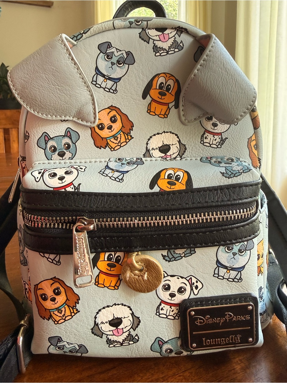 Loungefly Light Blue Puppy Print Mini Backpack with Gold-Tone Plate